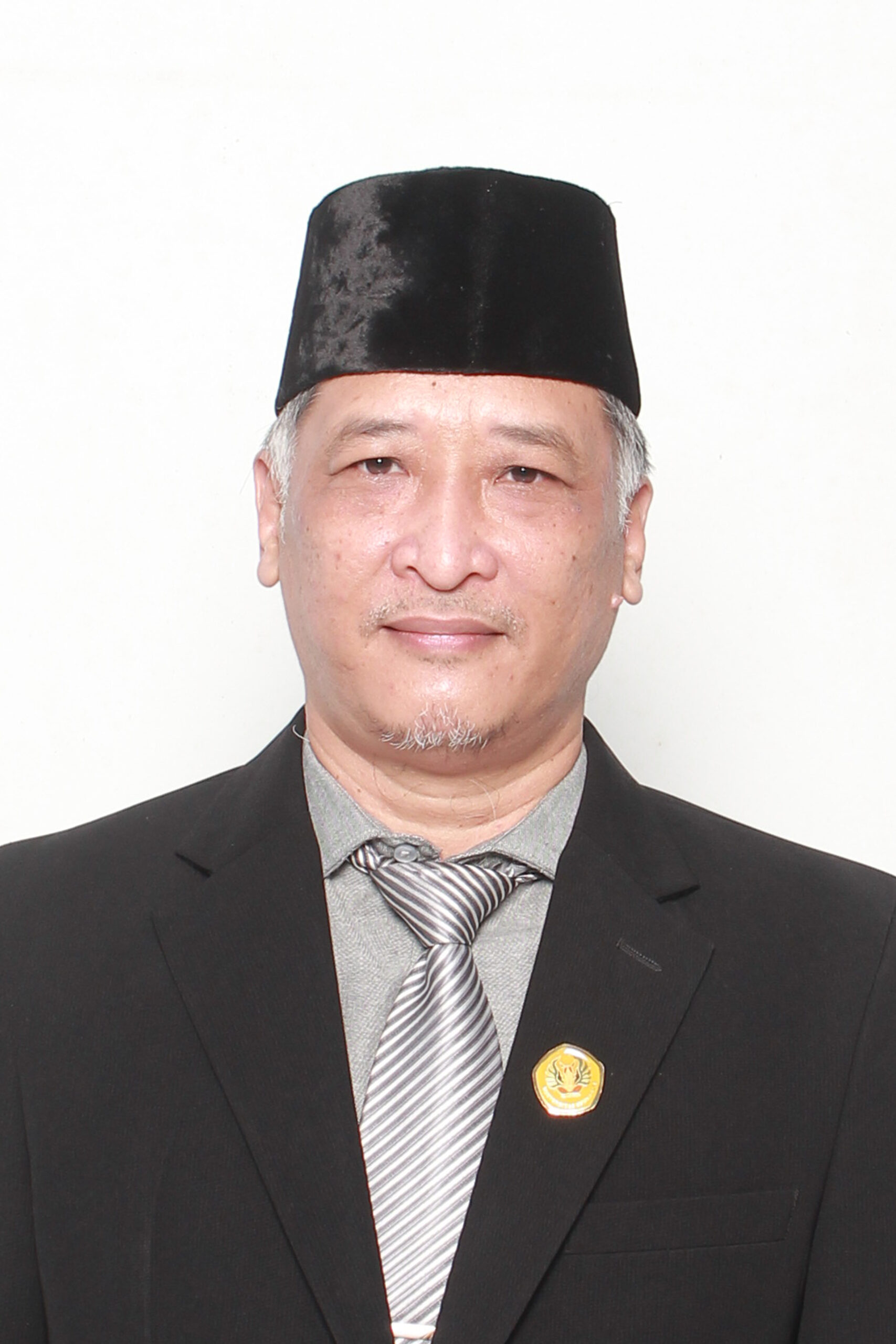 Fahmi Yusuf, S.Kom, M.M.S.I., Ph. D