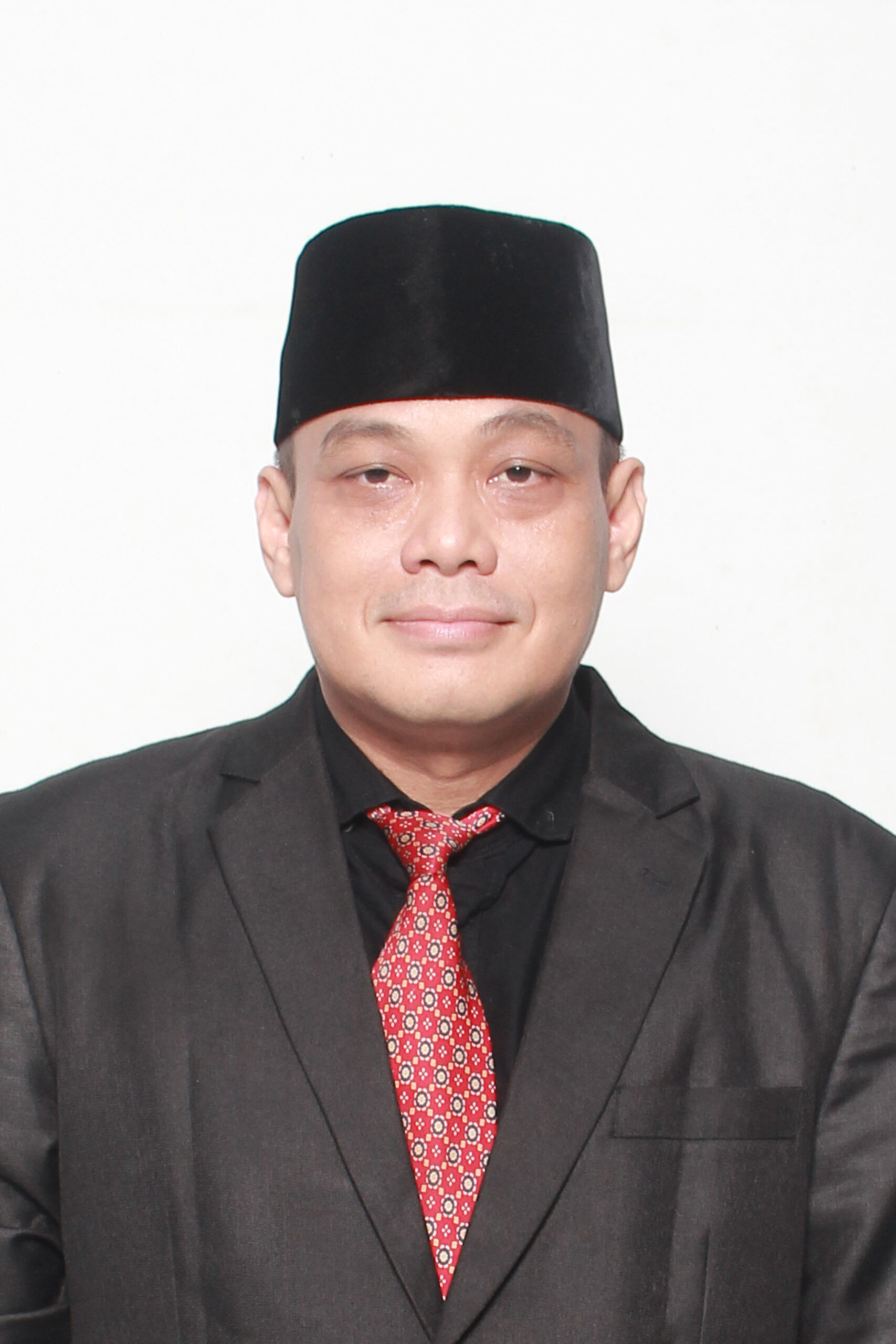 Dr. Dadang Suhardi, M.M