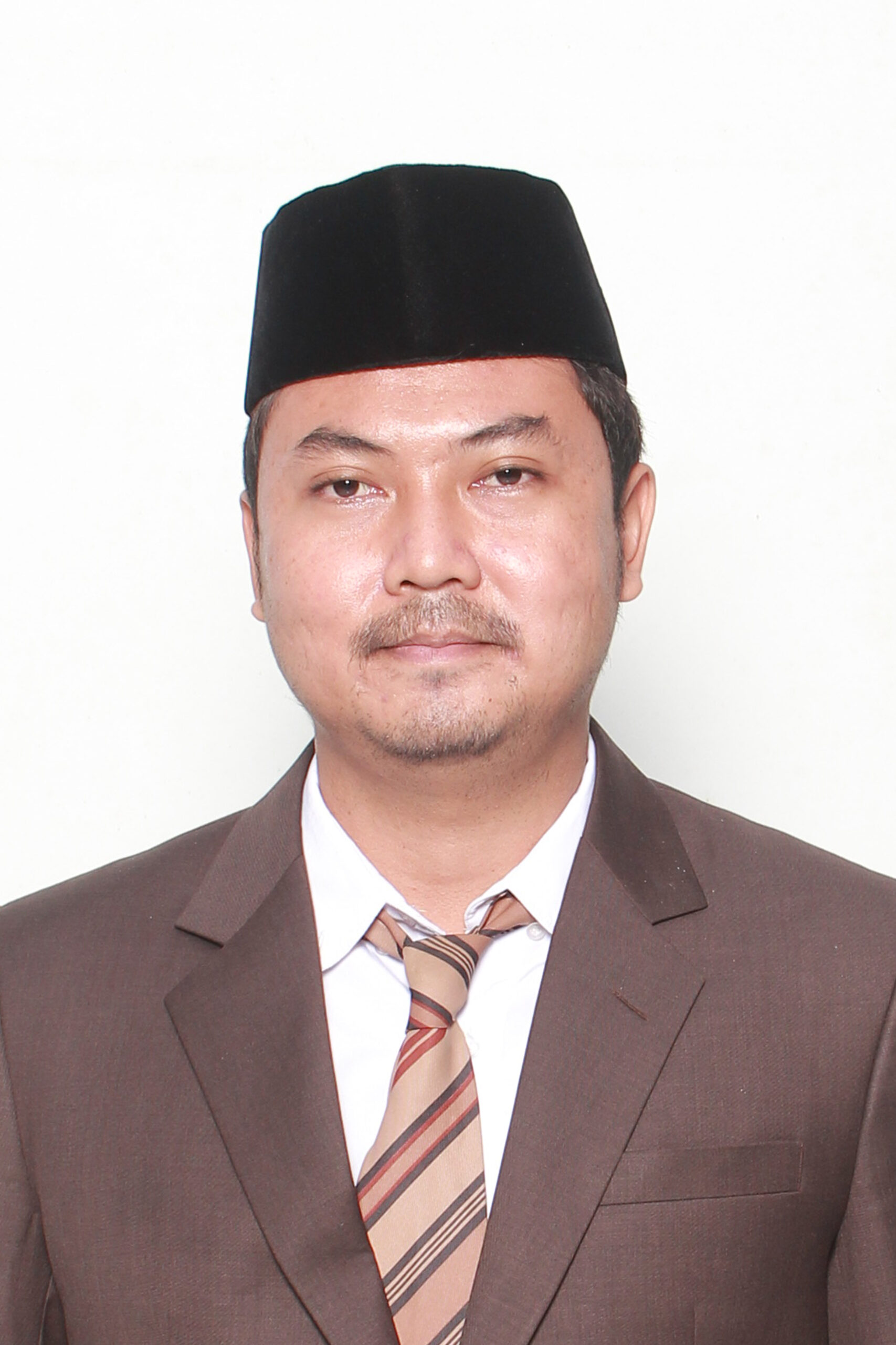 Dr. Munir Nur Komarudin, M.M